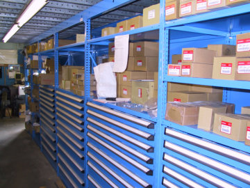 Rousseau - Drawer System in Shelving Supporting Second Level