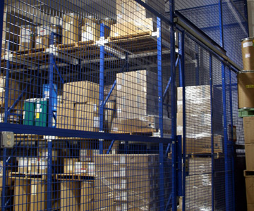 Drive-in Pallet Rack Storage located inside Wire Cage