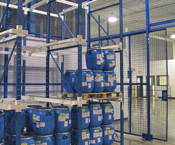 Drive-in Pallet Rack Storage located inside separate Wire Cage