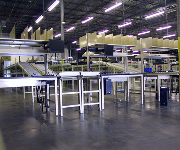 Conveyor-fed Pack Stations